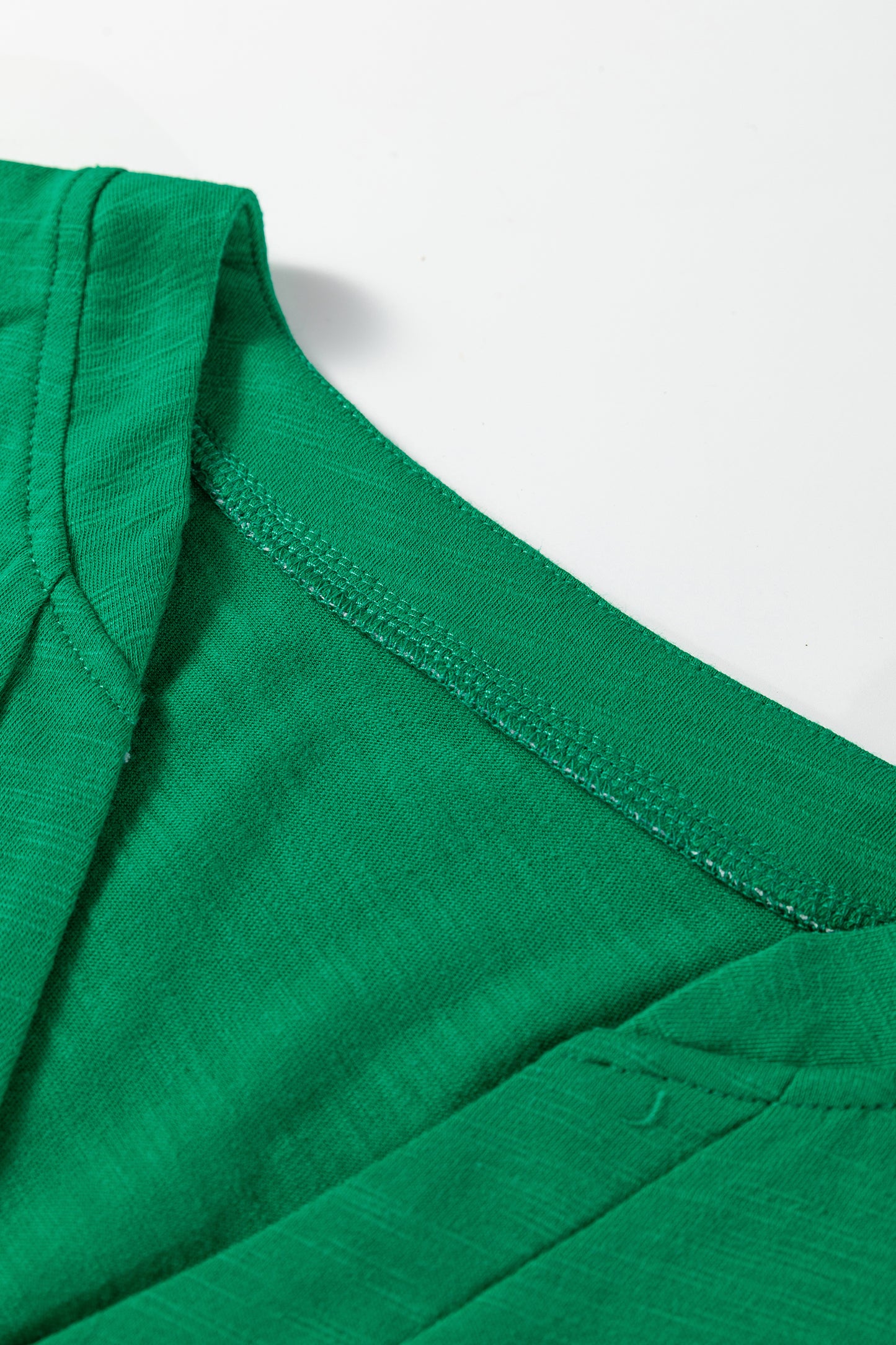 Emerald Green split neck button detail long sleeve top with gathered cuff sleeves