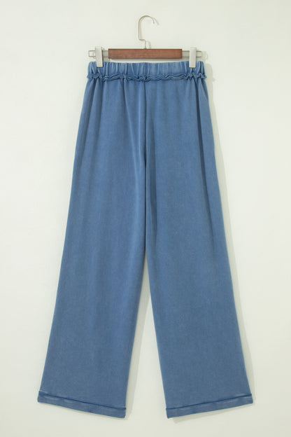 Dusty Blue washed cotton wide leg pants with drawstring waist, oversized patch pockets, and relaxed fit.