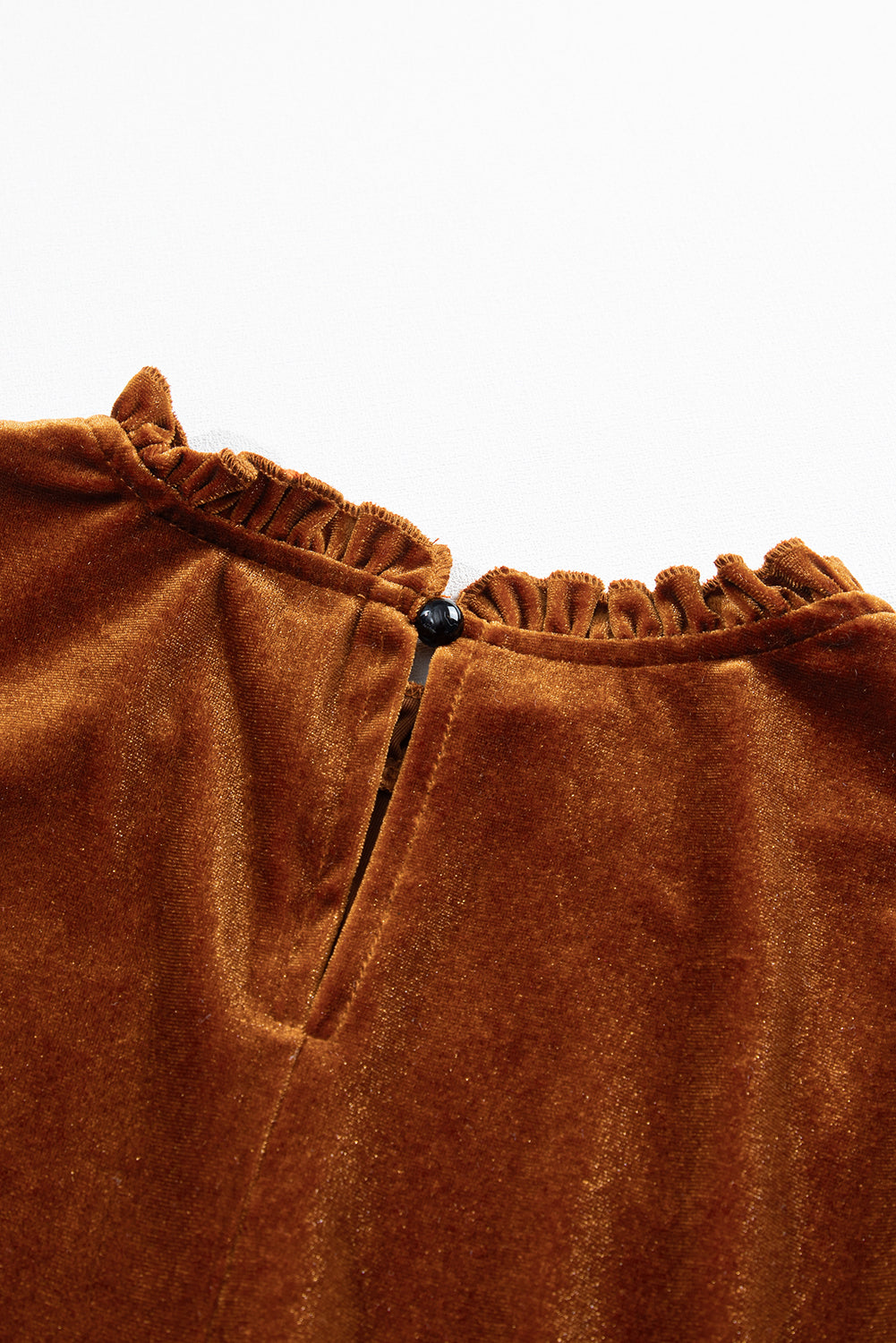 Women's caramel velvet mini dress featuring a ruffle mock neckline, long puff sleeves, elastic waist, and a fit-and-flare silhouette.