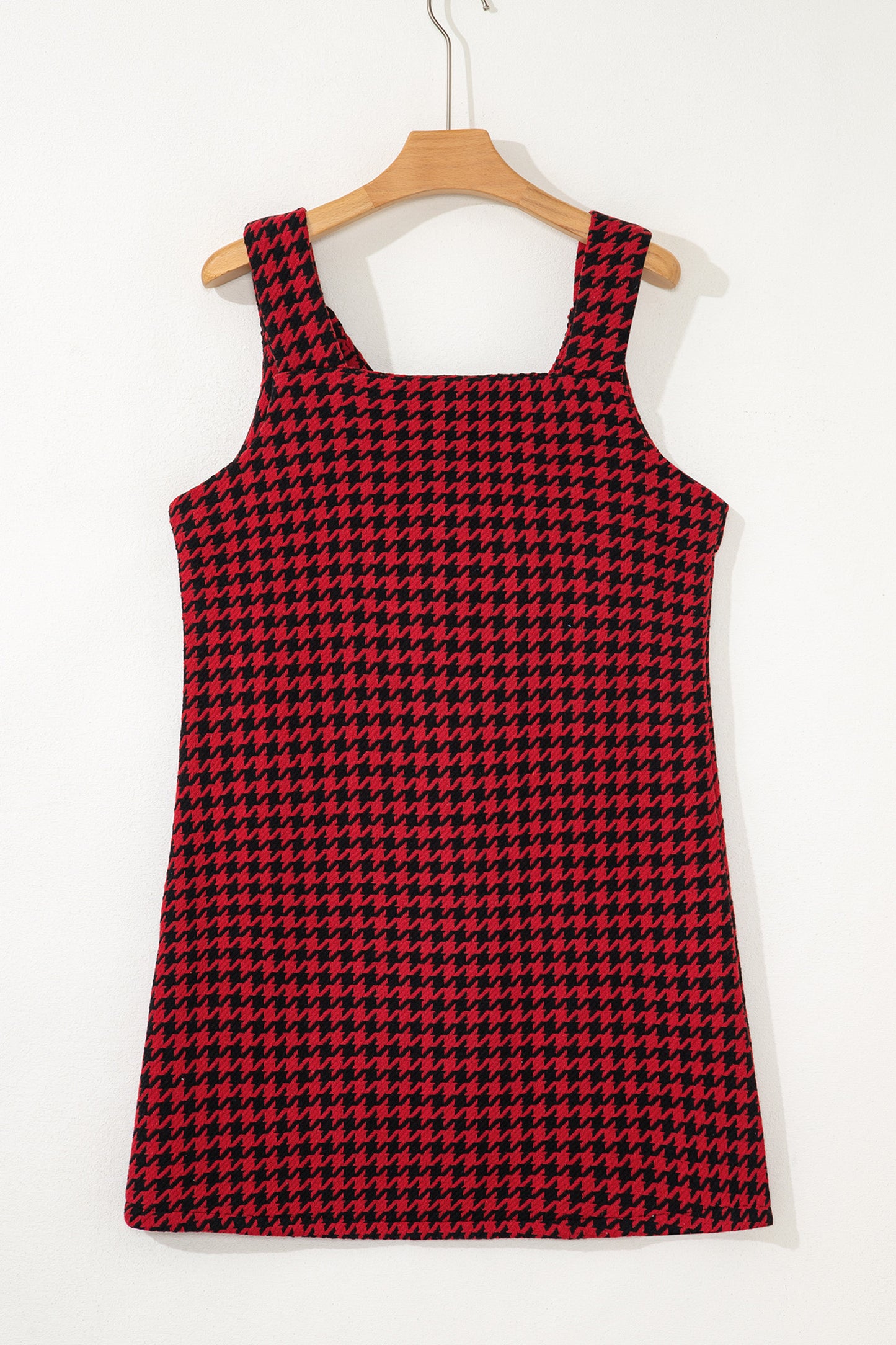Red textured houndstooth jacquard sleeveless mini dress with V-neckline and A-line silhouette.