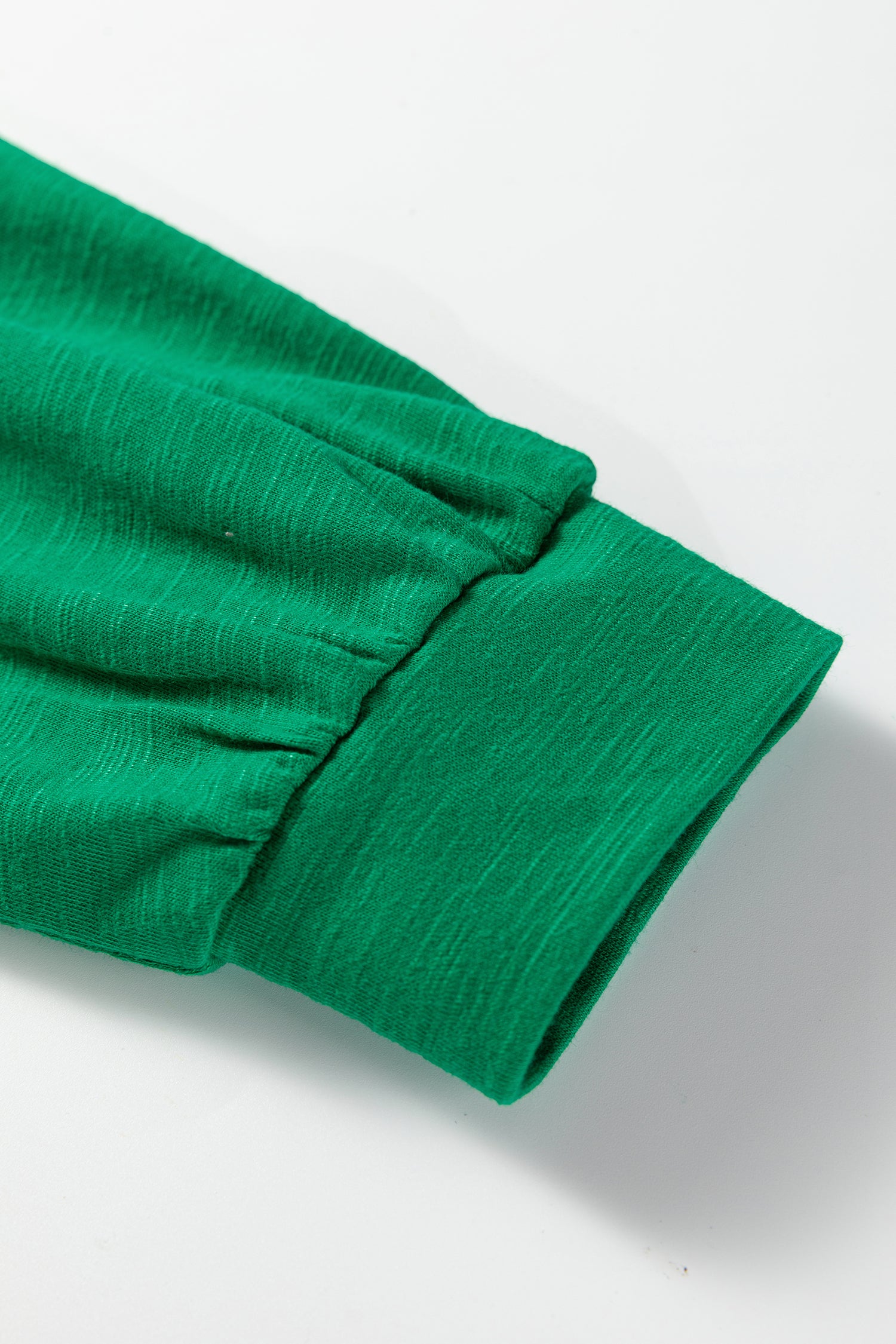 Emerald Green split neck button detail long sleeve top with gathered cuff sleeves