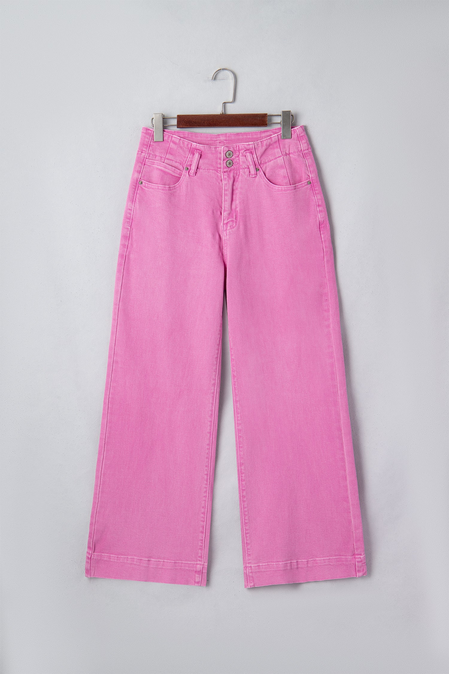 Pink high rise wide leg jeans with double-button waistband, front pockets and cropped hem.