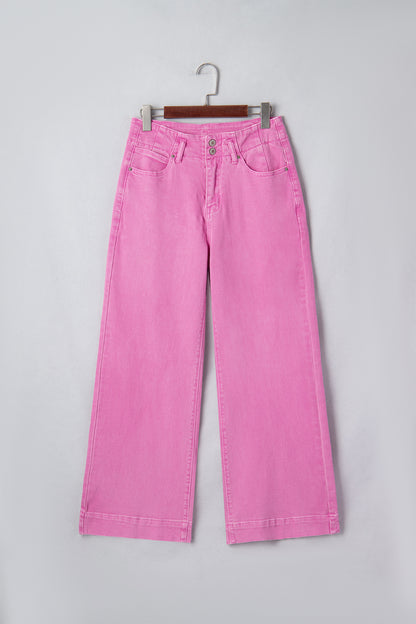Pink high rise wide leg jeans with double-button waistband, front pockets and cropped hem.