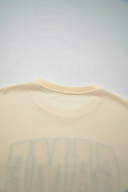 Cream Game Day embroidered sweatshirt and matching drawstring shorts set featuring long sleeves, blue contrast trim, relaxed fit, and casual sporty style.