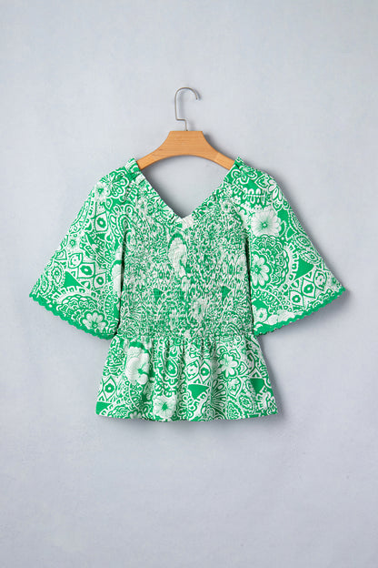 Green Floral Smocked Peplum Short Sleeve Blouse