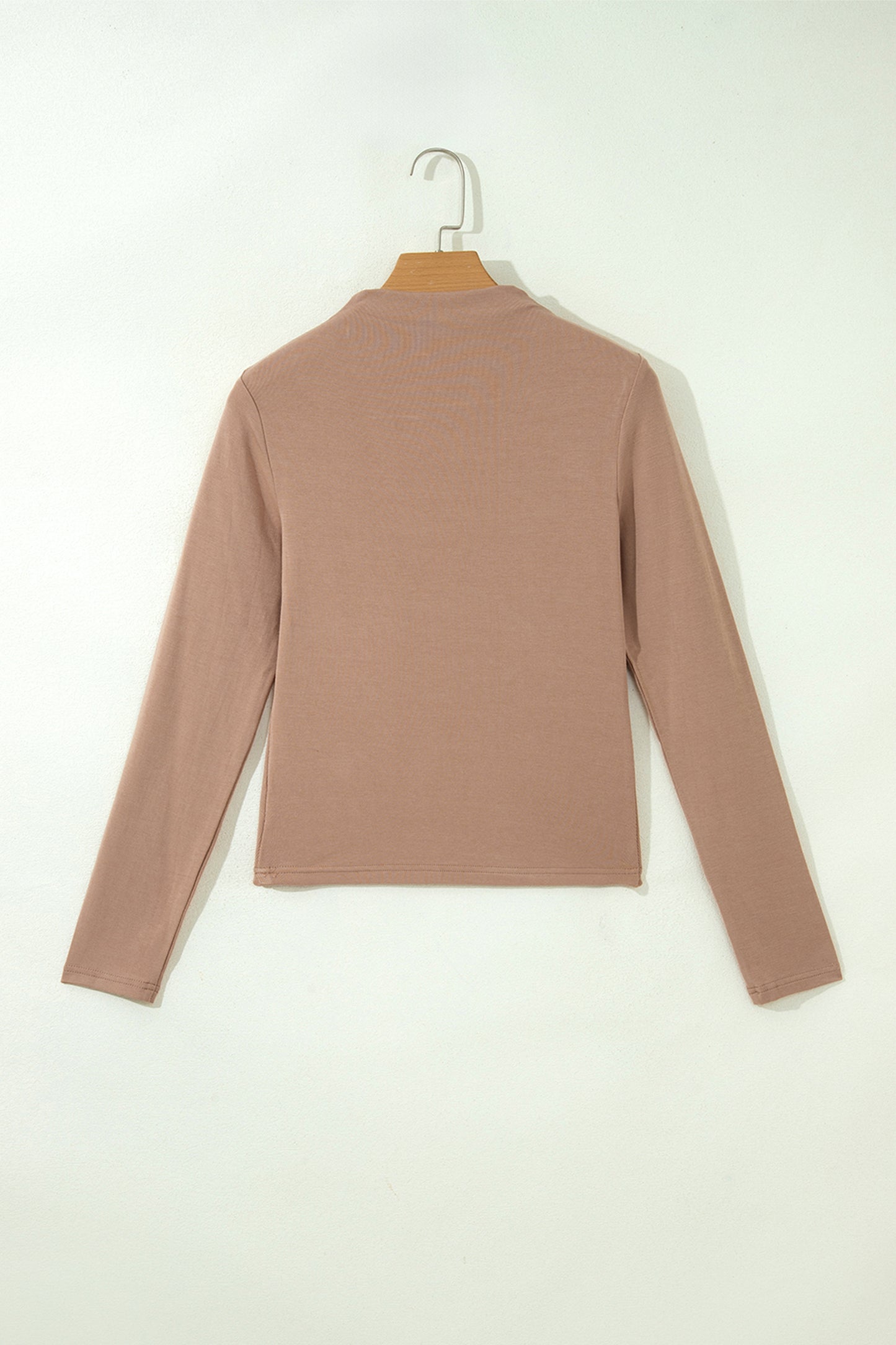Warm taupe fitted high neck long sleeve top with a smooth stretch-knit finish and regular-length hem.