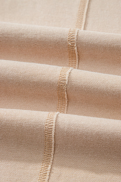 Sand washed cotton wide leg pants with drawstring waist, oversized patch pockets, and relaxed fit.