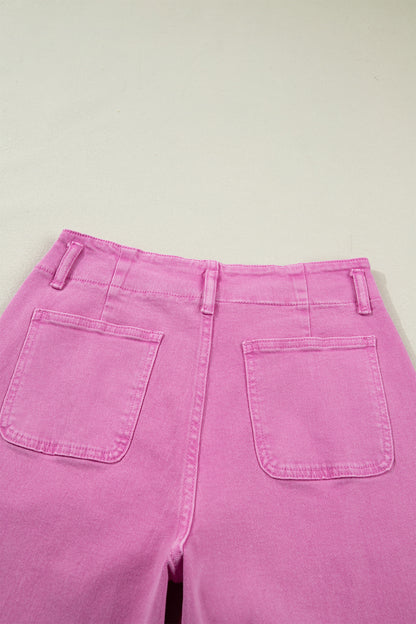 Pink high rise wide leg jeans with double-button waistband, front pockets and cropped hem.