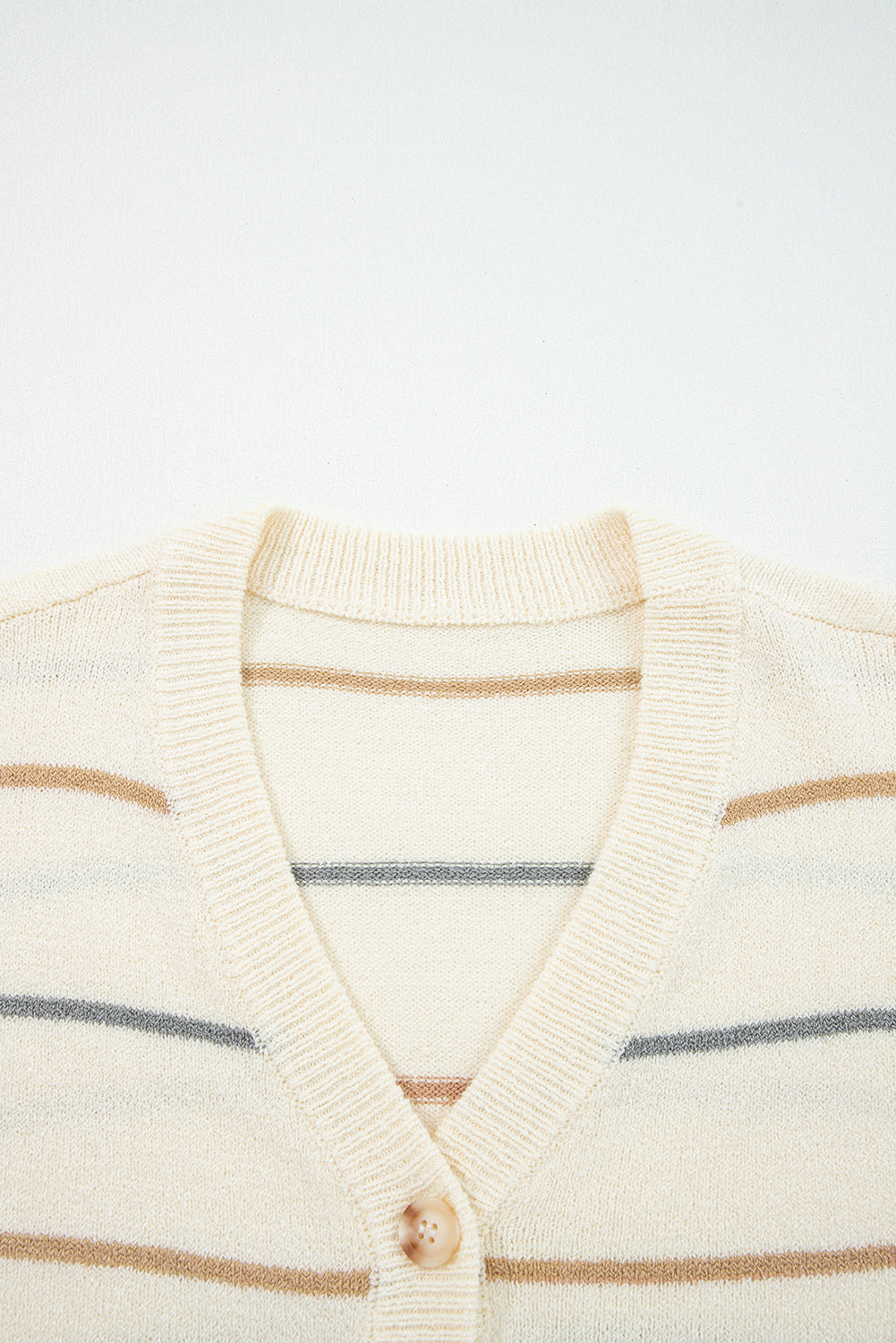 Cream striped button-front cardigan with camel tan and dusty blue-gray stripes, V-neckline, and relaxed drop-shoulder sleeves