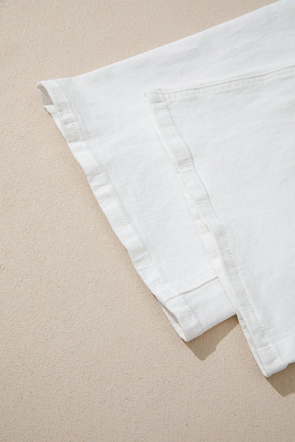 Women’s white high-waist wide-leg jeans with classic five-pocket styling and a relaxed full-length silhouette