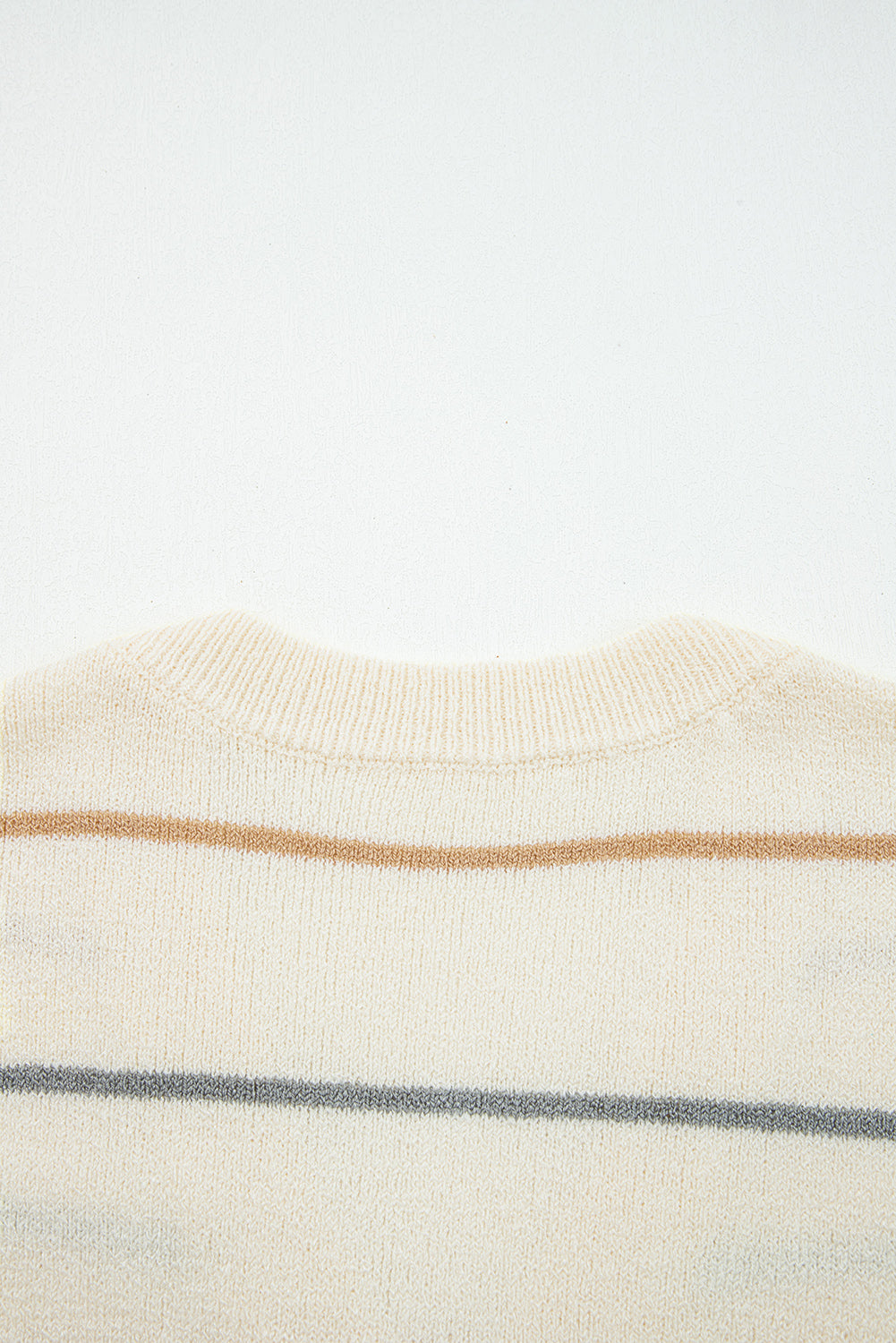 Cream striped button-front cardigan with camel tan and dusty blue-gray stripes, V-neckline, and relaxed drop-shoulder sleeves