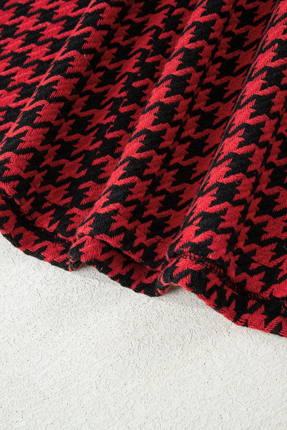 Red textured houndstooth jacquard sleeveless mini dress with V-neckline and A-line silhouette.
