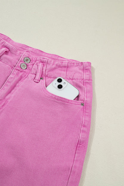 Pink high rise wide leg jeans with double-button waistband, front pockets and cropped hem.