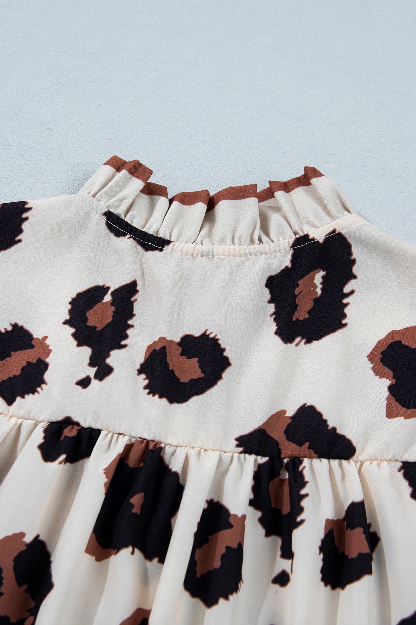 Cream Leopard Print Ruffle Cap Sleeve Blouse – Boutique Animal Print Top