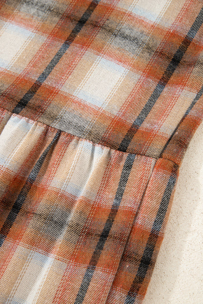 Caramel plaid tunic shirt dress with collared neckline, button front, chest pockets, long sleeves, and relaxed mini silhouette.