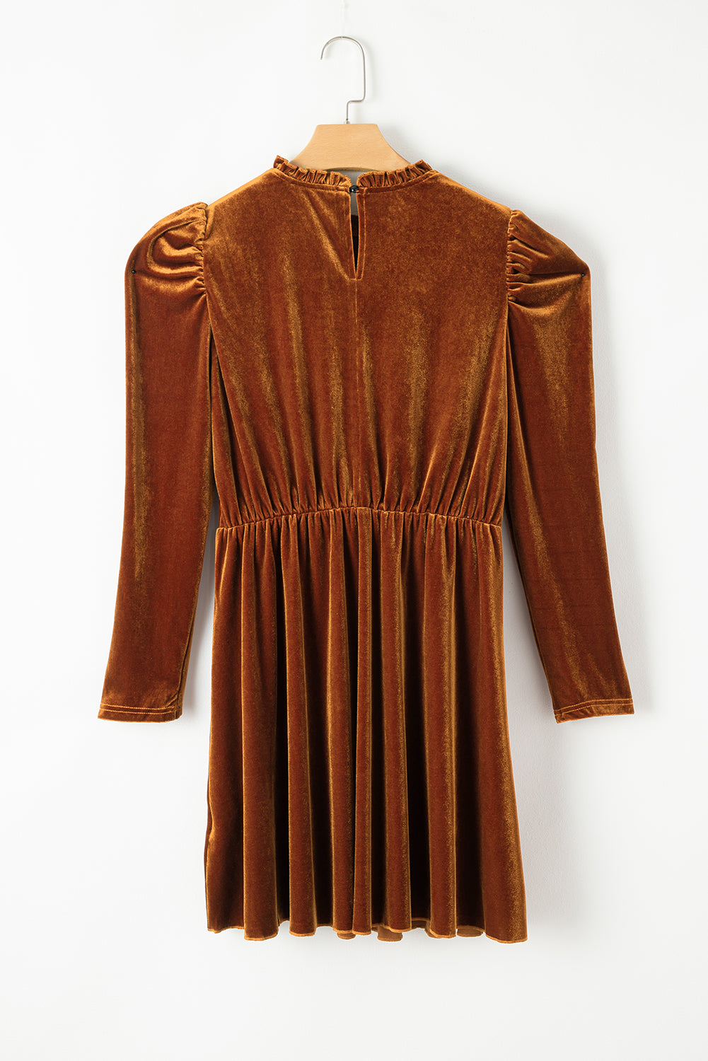 Women's caramel velvet mini dress featuring a ruffle mock neckline, long puff sleeves, elastic waist, and a fit-and-flare silhouette.