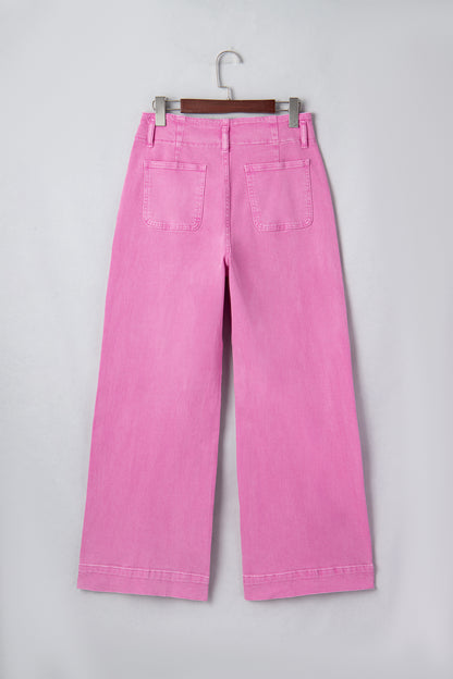 Pink high rise wide leg jeans with double-button waistband, front pockets and cropped hem.