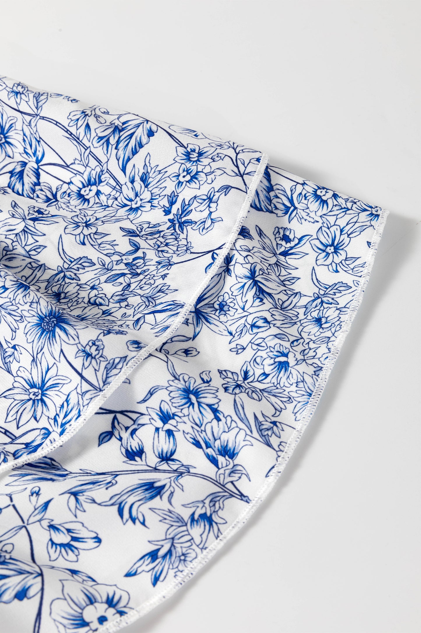 Blue Floral Square Neck Smocked Babydoll Blouse with Flutter Sleeves
