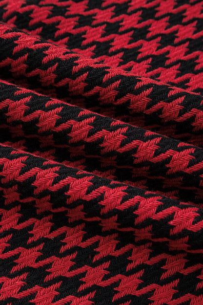 Red textured houndstooth jacquard sleeveless mini dress with V-neckline and A-line silhouette.