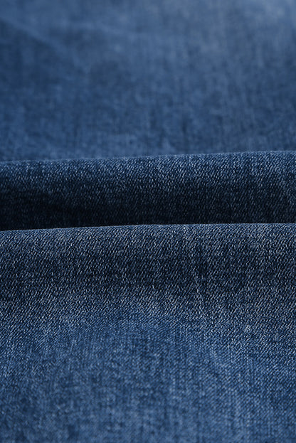 Medium wash blue distressed slim straight leg jeans with drawstring elastic waist and raw hem