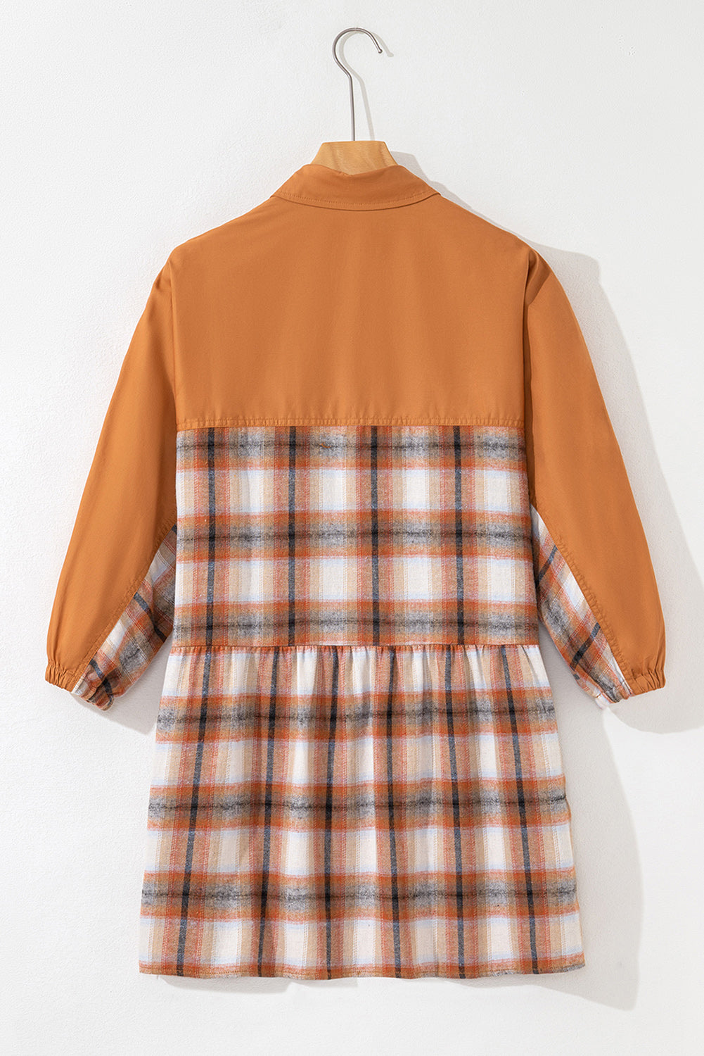 Caramel plaid tunic shirt dress with collared neckline, button front, chest pockets, long sleeves, and relaxed mini silhouette.