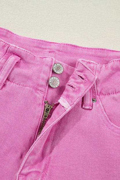 Pink high rise wide leg jeans with double-button waistband, front pockets and cropped hem.