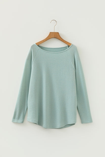 Seafoam Mist textured raglan long sleeve top with round neckline, relaxed fit, and curved hem