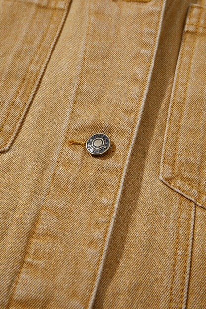 Tan women's denim jacket with metal button front, collared neckline, long sleeves, patch pockets, and relaxed fit.