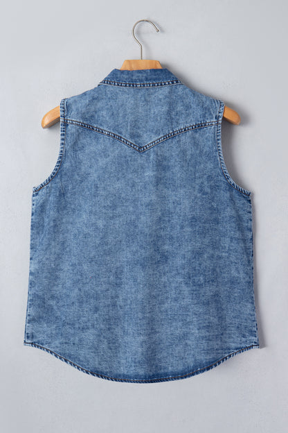 Women's Vintage Denim Wash Acid Wash Sleeveless Denim Button-Up Tank Top featuring a collared neckline, snap button front, western yoke, flap chest pockets, and curved hem.