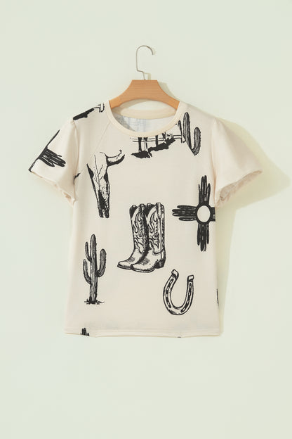 Cream Western graphic print top with crew neckline, short sleeves with gathered armholes, and black cowboy boot, cactus, horseshoe, and Southwestern motifs.