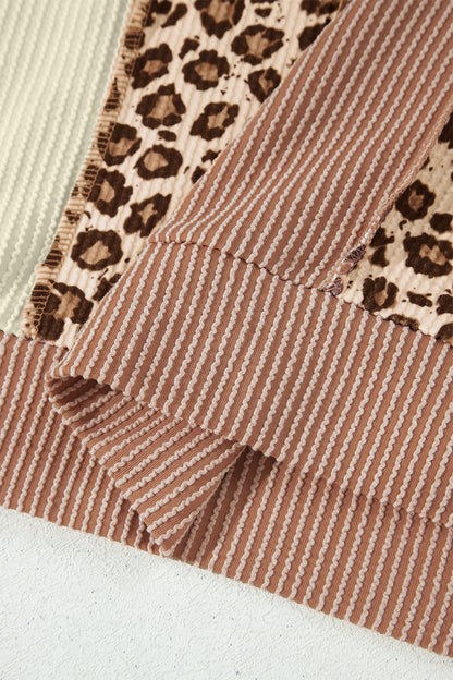 mocha brown leopard colorblock ribbed knit top with a round neckline, dropped shoulders, relaxed fit, and long sleeves.