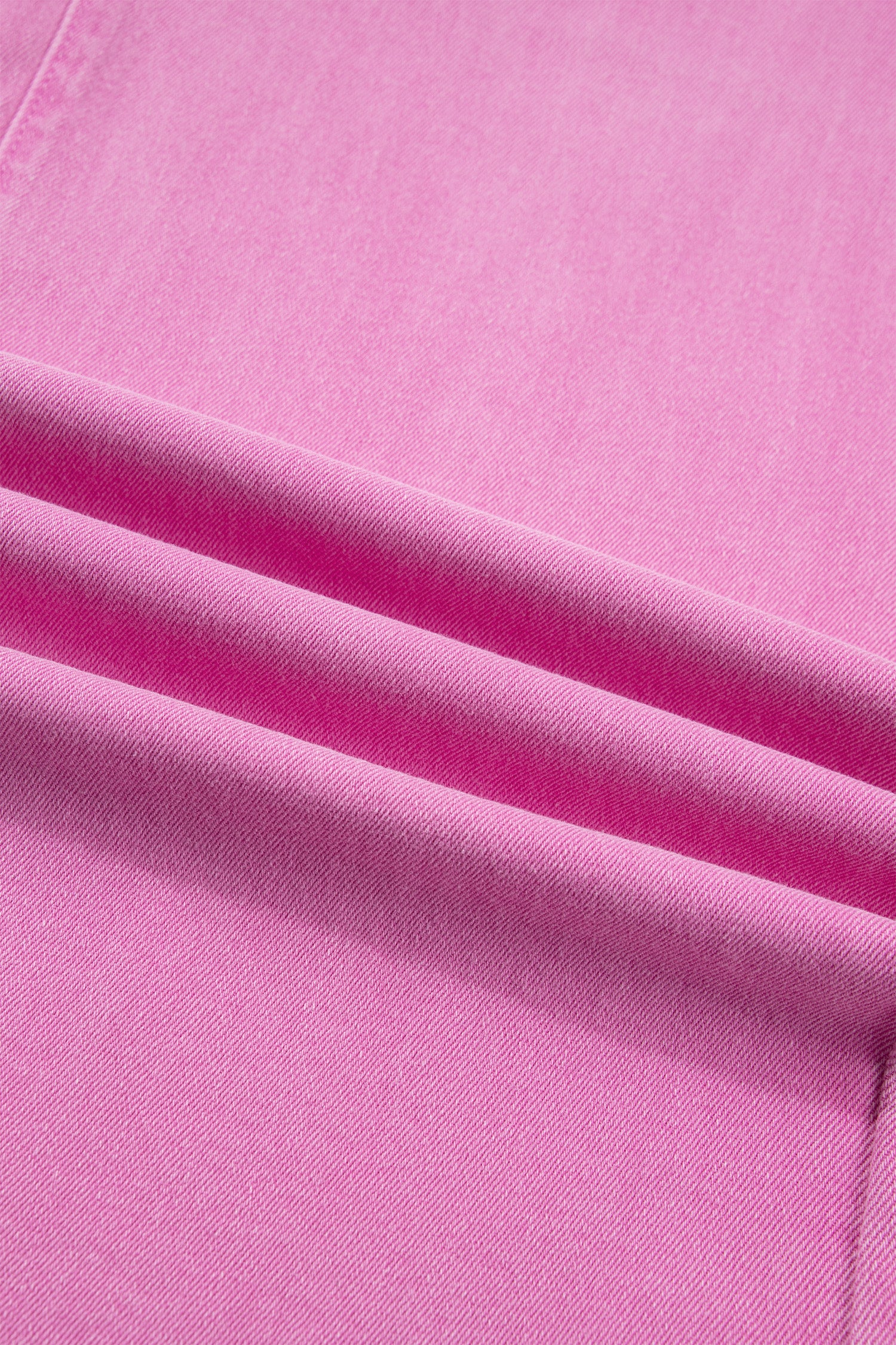 Pink high rise wide leg jeans with double-button waistband, front pockets and cropped hem.