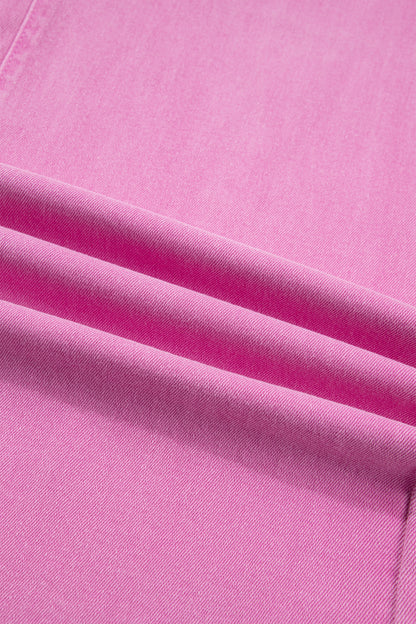 Pink high rise wide leg jeans with double-button waistband, front pockets and cropped hem.