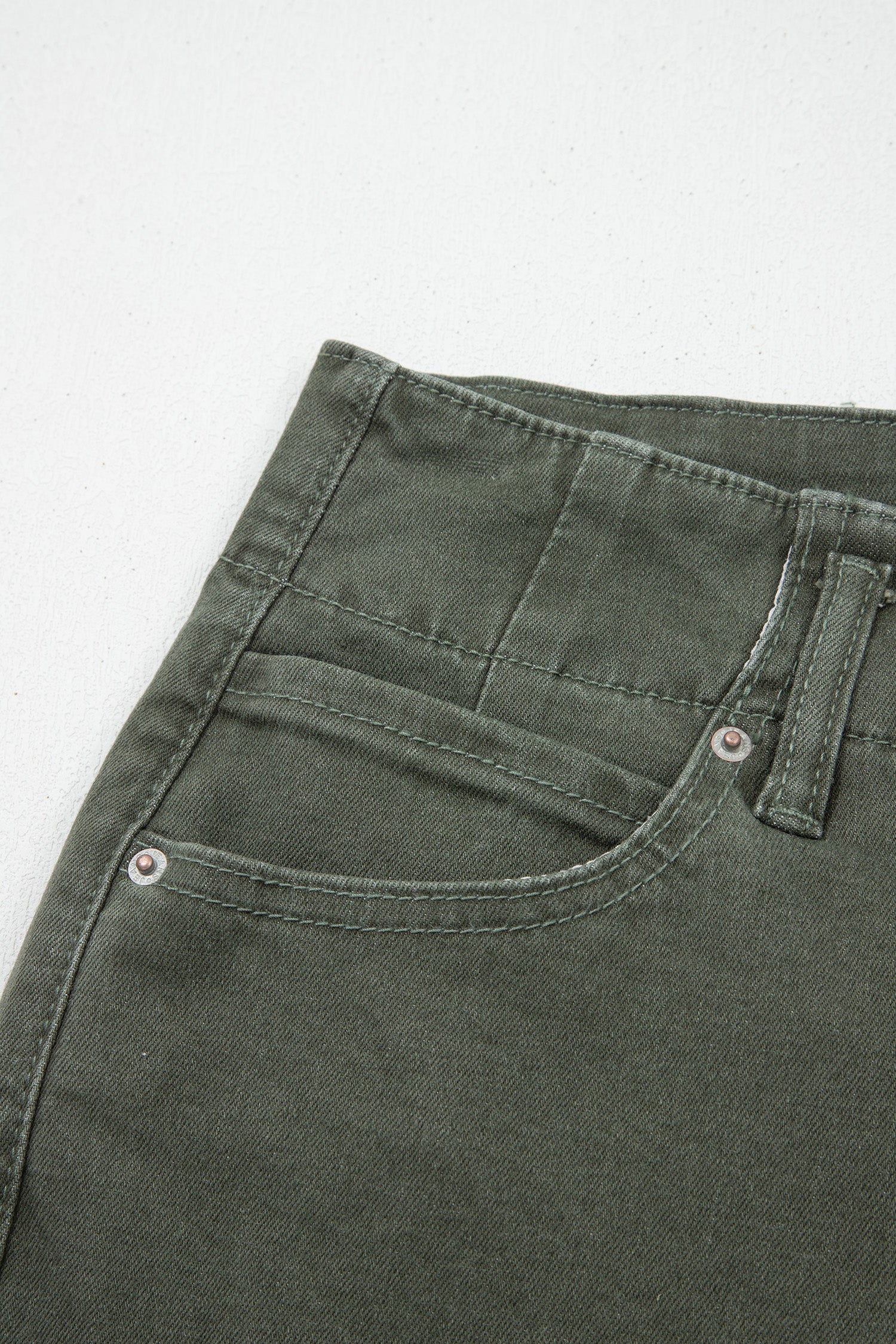Olive green high rise wide leg jeans with double-button waistband, front pockets and cropped hem.