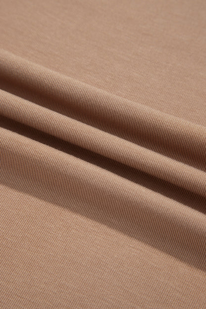 Warm taupe fitted high neck long sleeve top with a smooth stretch-knit finish and regular-length hem.