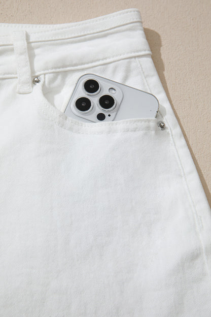 Women’s white high-waist wide-leg jeans with classic five-pocket styling and a relaxed full-length silhouette