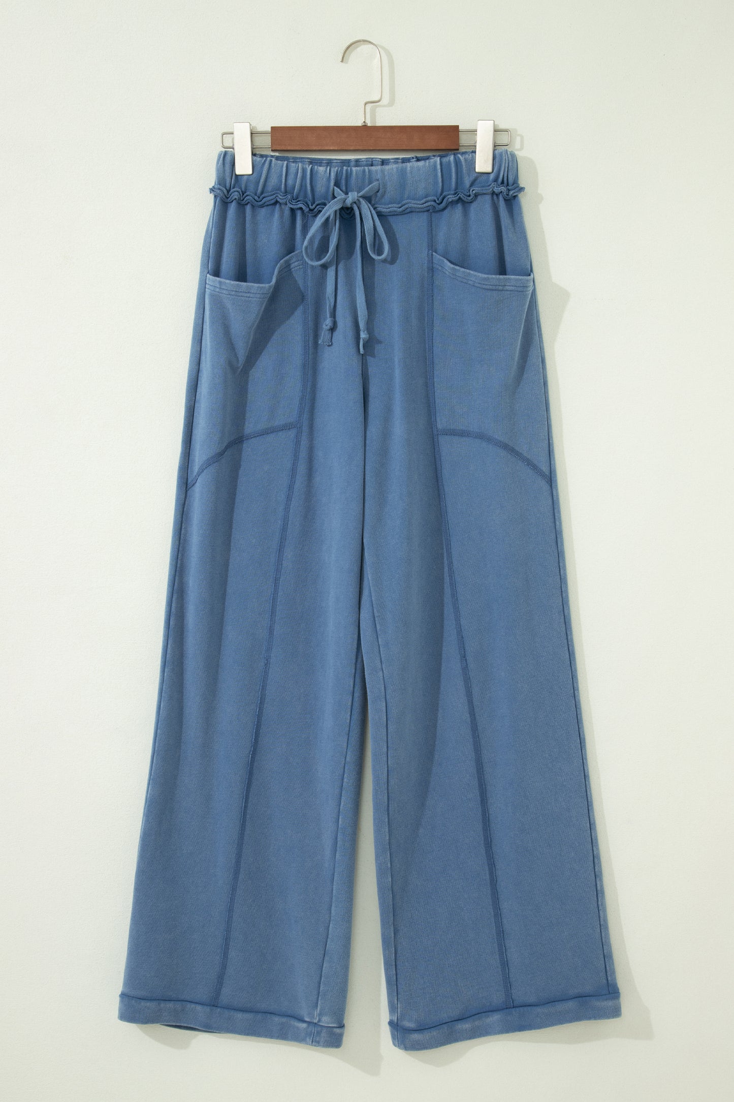 Dusty Blue washed cotton wide leg pants with drawstring waist, oversized patch pockets, and relaxed fit.