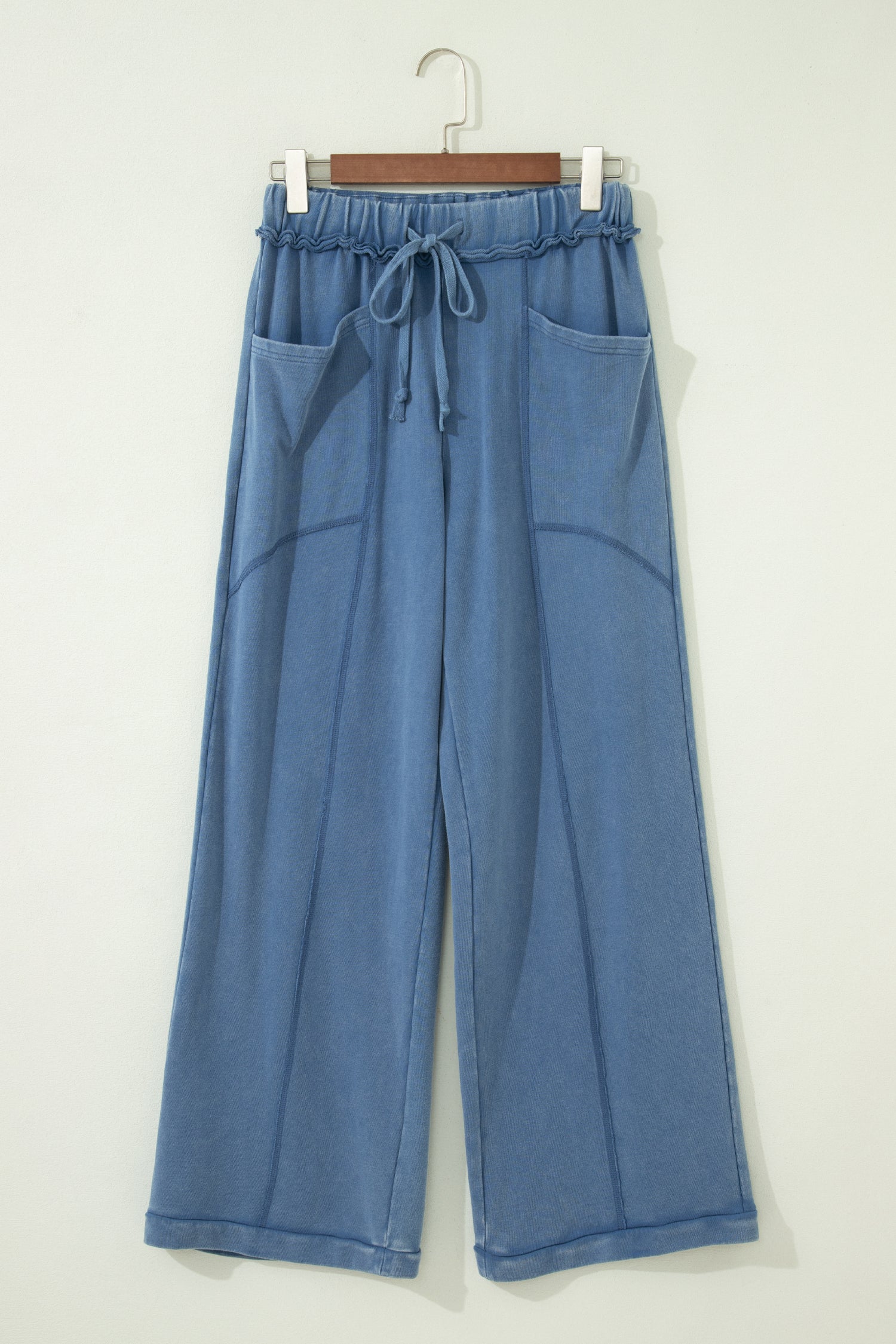 Dusty Blue washed cotton wide leg pants with drawstring waist, oversized patch pockets, and relaxed fit.