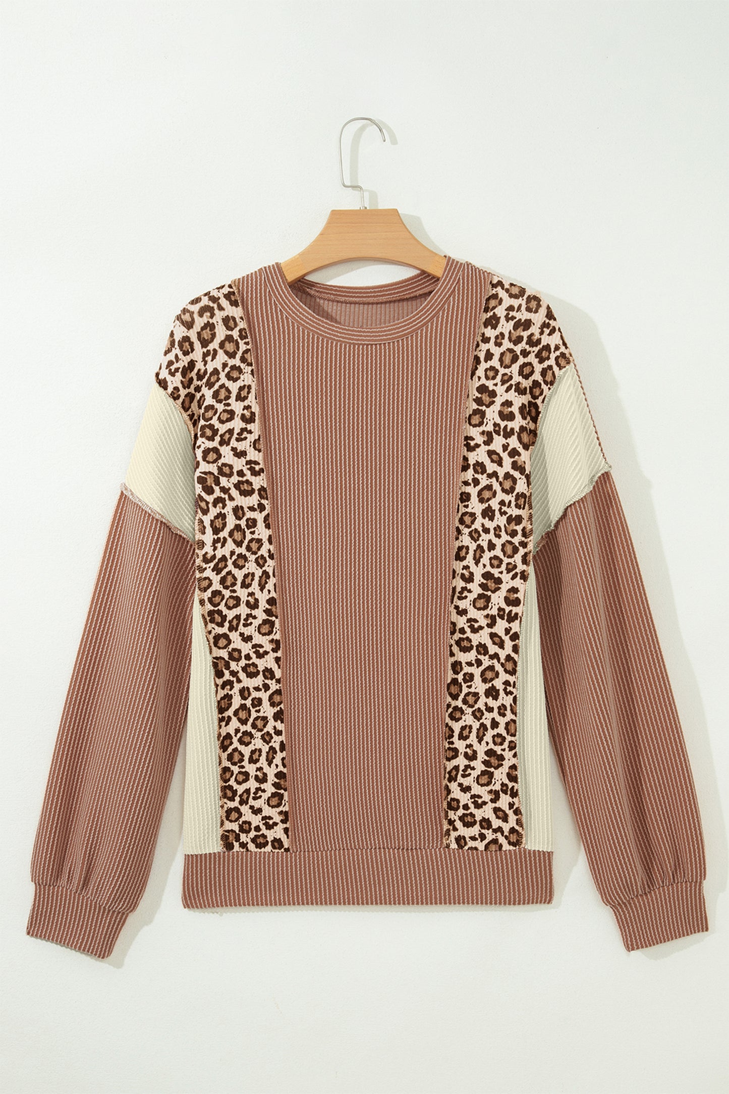 mocha brown leopard colorblock ribbed knit top with a round neckline, dropped shoulders, relaxed fit, and long sleeves.