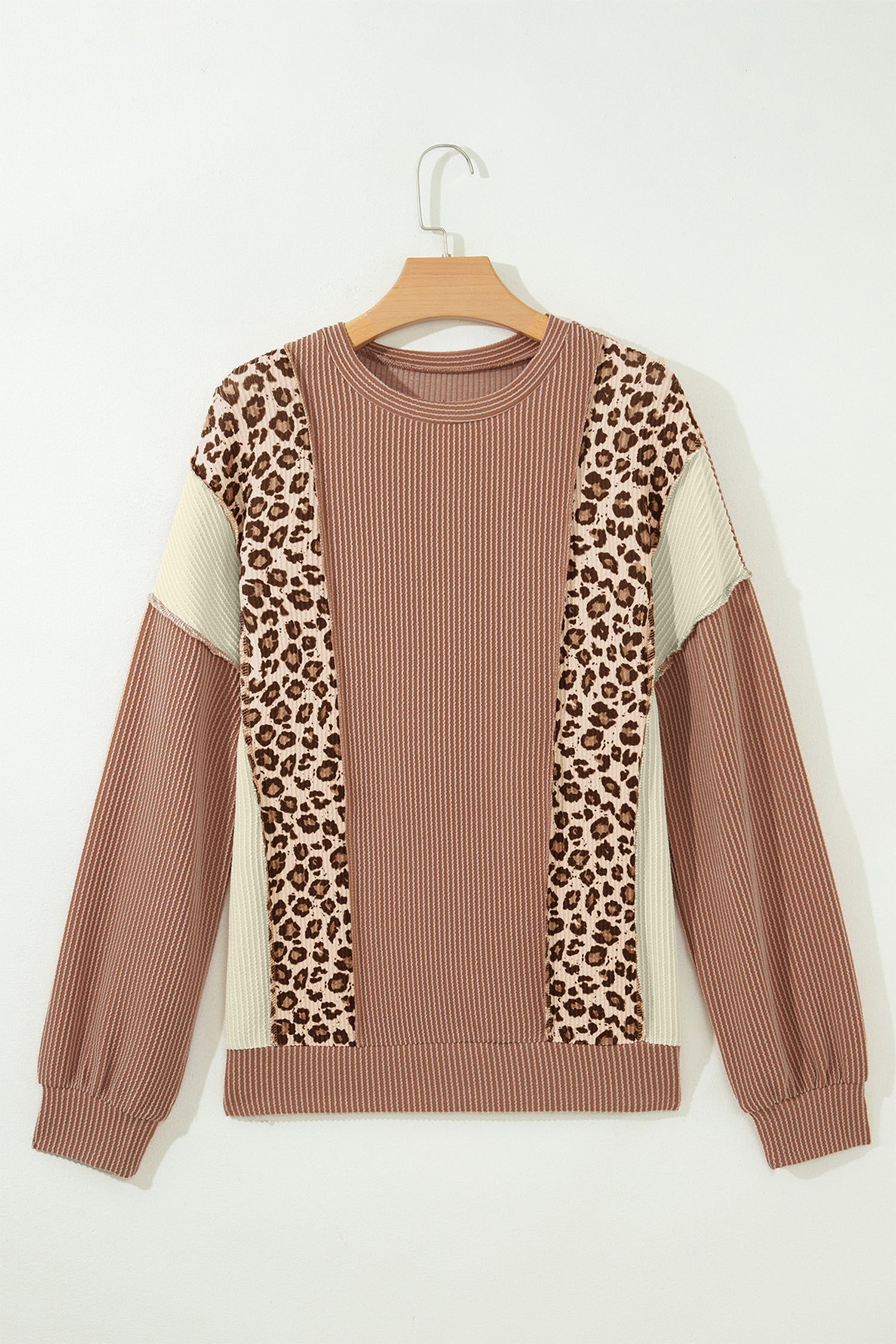 mocha brown leopard colorblock ribbed knit top with a round neckline, dropped shoulders, relaxed fit, and long sleeves.