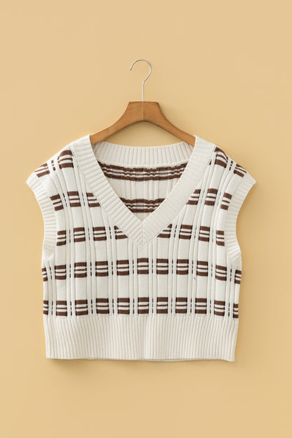 Oatmeal knit sweater vest with brown striped pattern, V-neckline, sleeveless design, and ribbed trim.