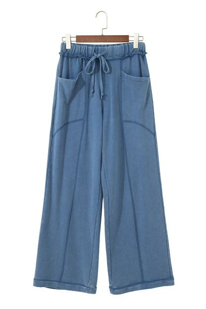Dusty Blue washed cotton wide leg pants with drawstring waist, oversized patch pockets, and relaxed fit.