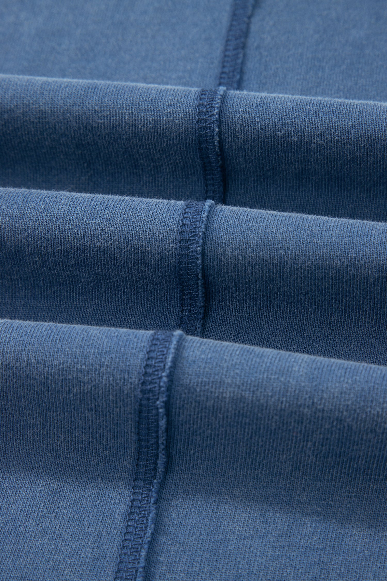 Dusty Blue washed cotton wide leg pants with drawstring waist, oversized patch pockets, and relaxed fit.