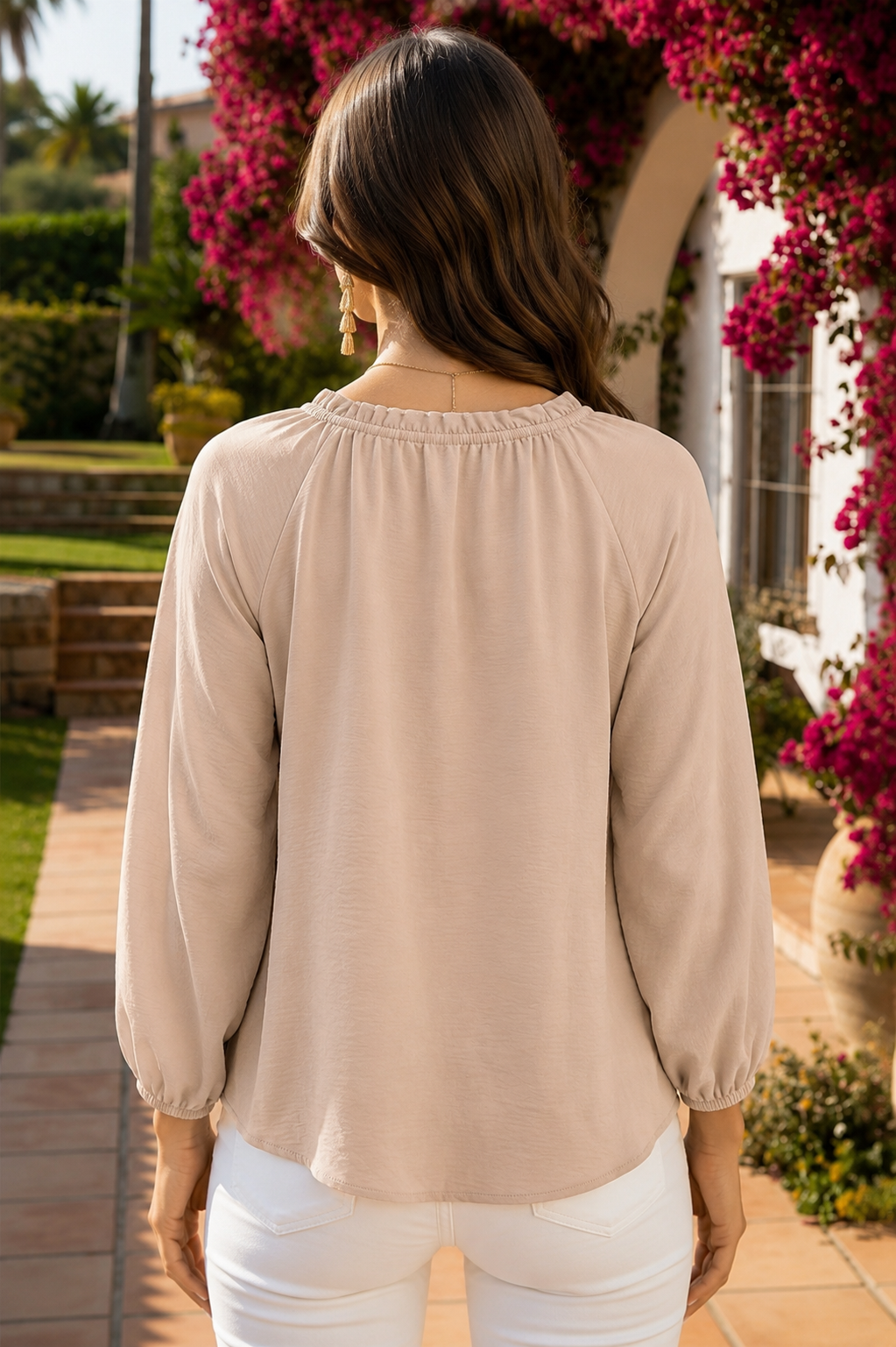 Beige textured women's blouse featuring a ruffle split neckline, relaxed silhouette, three-quarter sleeves, and gathered elastic cuffs.