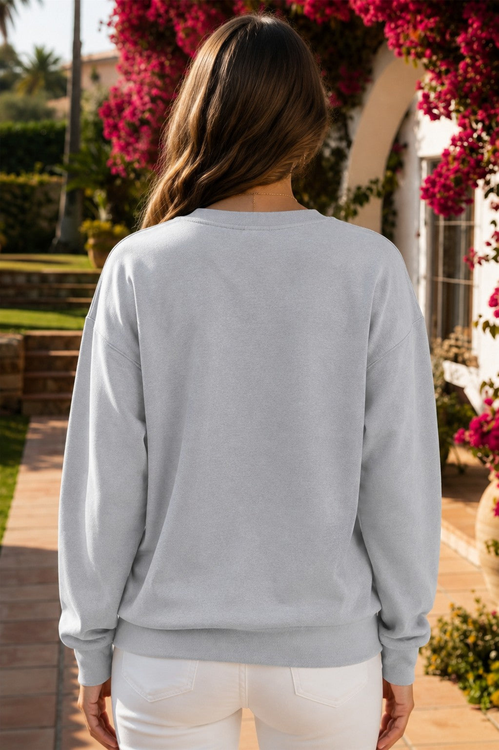Light gray PRAY patchwork crewneck sweatshirt with floral, pink striped, plaid and black appliqué lettering.