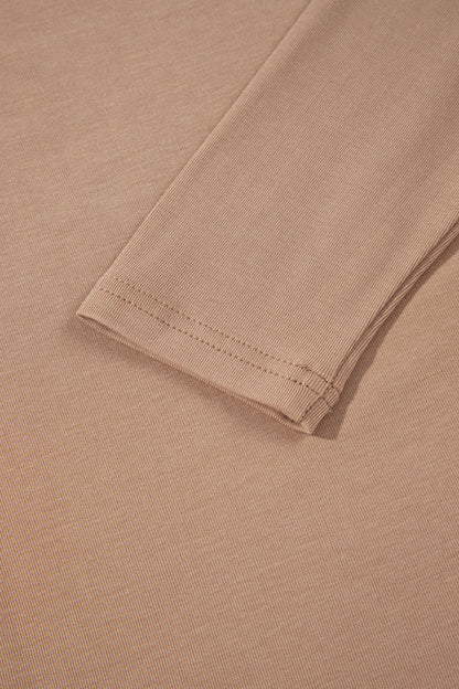 Warm taupe fitted high neck long sleeve top with a smooth stretch-knit finish and regular-length hem.