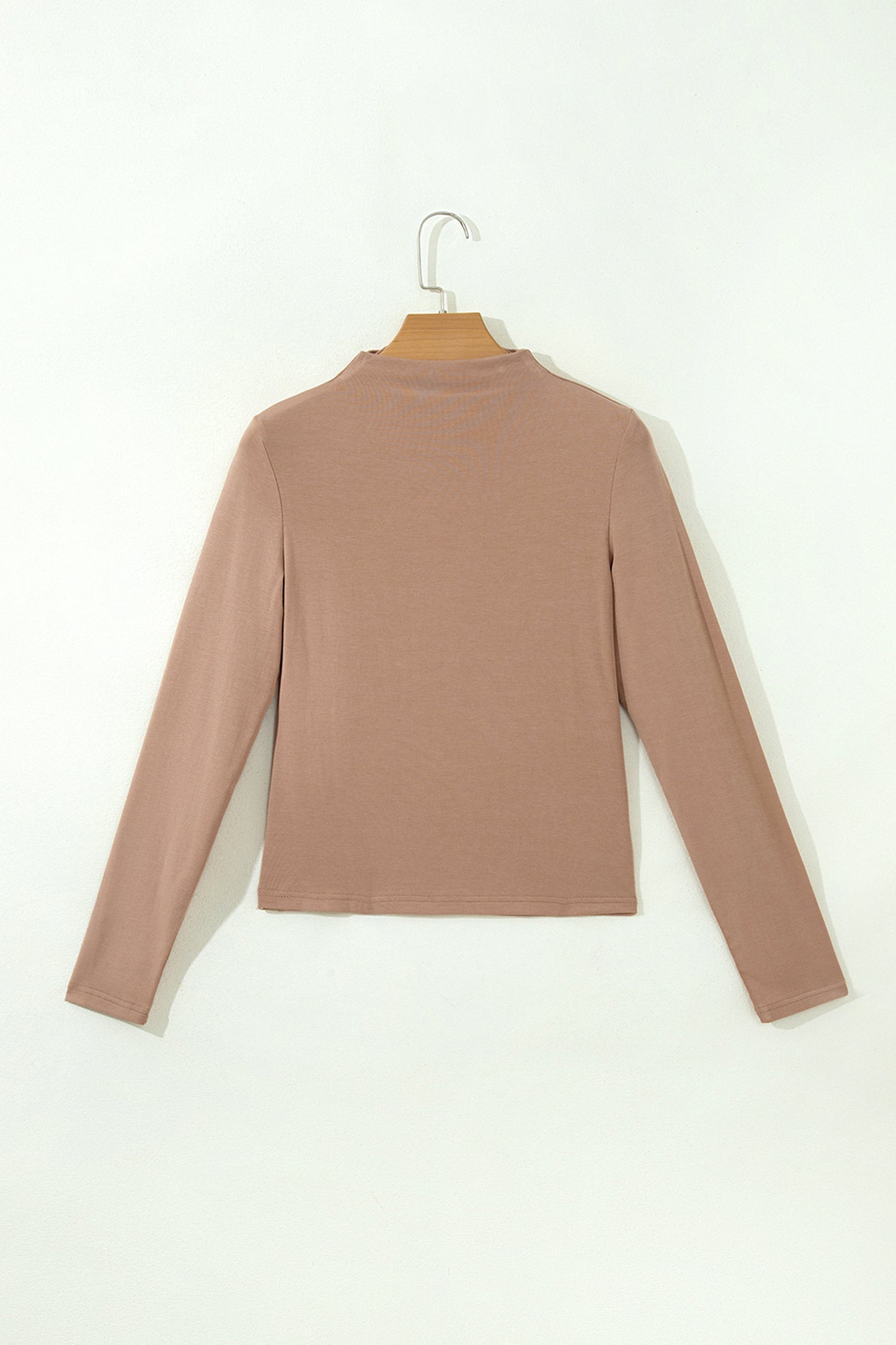 Warm taupe fitted high neck long sleeve top with a smooth stretch-knit finish and regular-length hem.