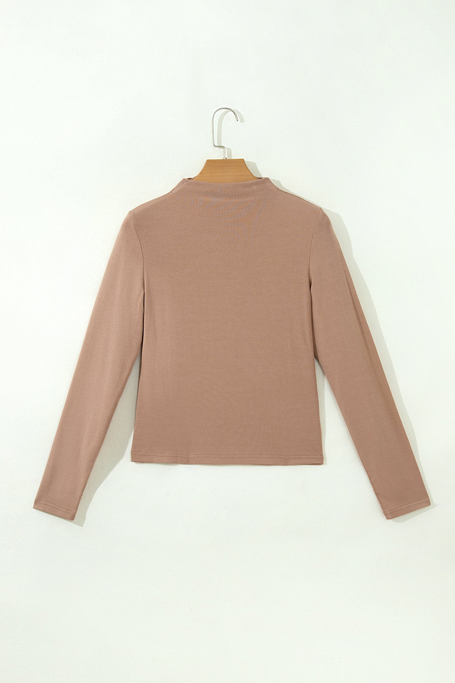 Warm taupe fitted high neck long sleeve top with a smooth stretch-knit finish and regular-length hem.