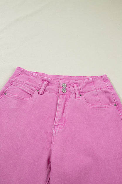 Pink high rise wide leg jeans with double-button waistband, front pockets and cropped hem.