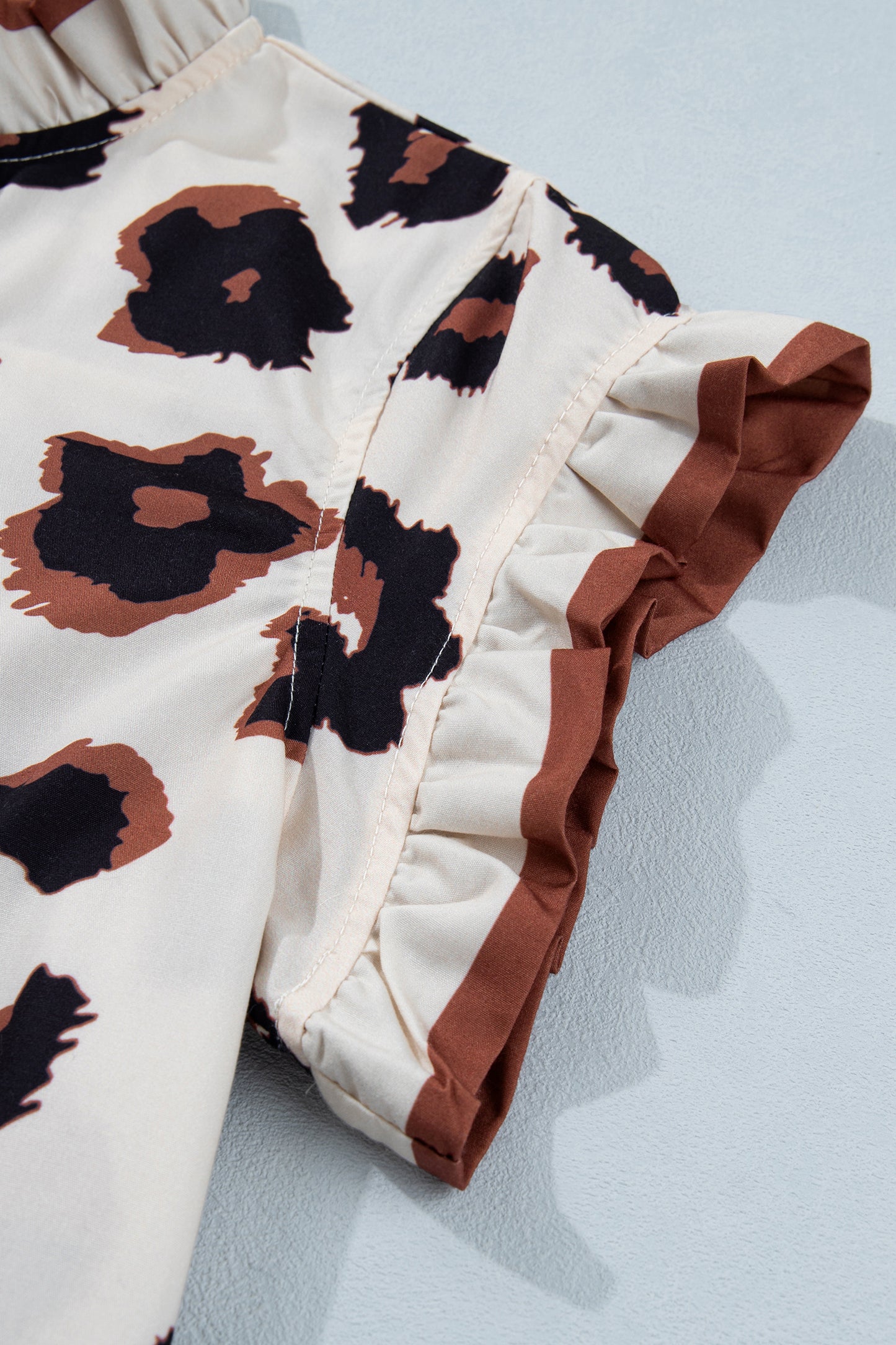 Cream Leopard Print Ruffle Cap Sleeve Blouse – Boutique Animal Print Top
